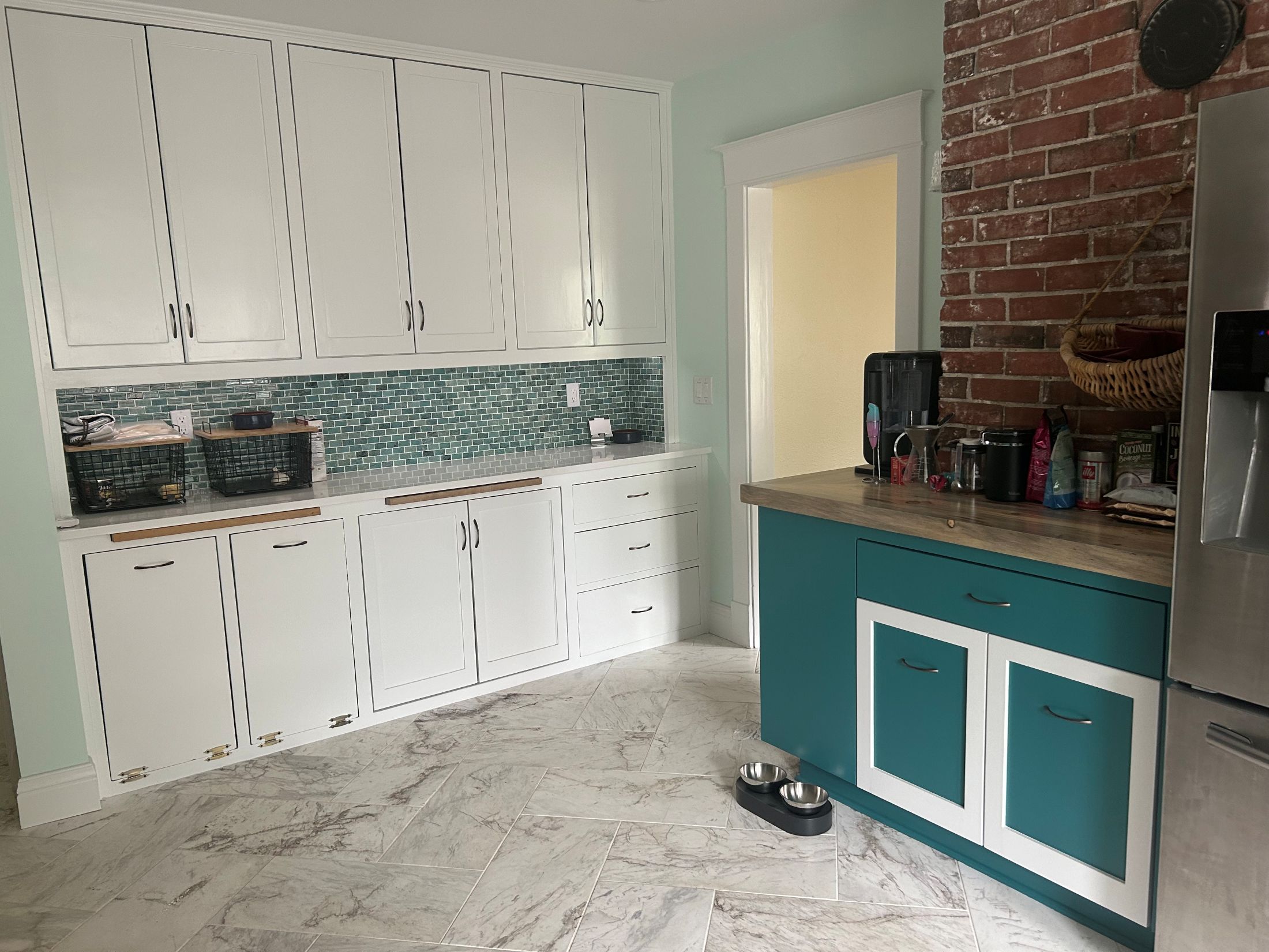 Lavender Residency Kitchen with Accent Brick Wall